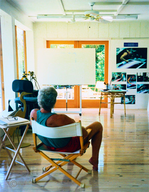Hal contemplates a blank canvas – psyching up to begin his exotic Bahamas Series, Photo by B.J. Stowers © 1990