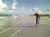 "It's like a 'walking prayer' in a 360 degree open air cathedral…" Hal walking on a pristine barrier island beach along the Gulf of Mexico.   Photo by B.J. Stowers ©2008