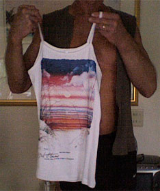 Hal Stowers holds women's Strappy Tank imprinted with "Sea Oats Passion" - Wearable Art from "Hal Stowers Sunset Wear LIFE BLENDING® Collection"